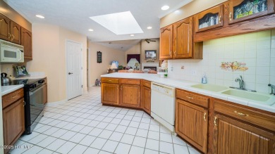 Welcome to this charming all-brick custom built home in Carolina on Carolina Shores Golf Course in North Carolina - for sale on GolfHomes.com, golf home, golf lot