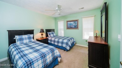 Welcome to this charming all-brick custom built home in Carolina on Carolina Shores Golf Course in North Carolina - for sale on GolfHomes.com, golf home, golf lot