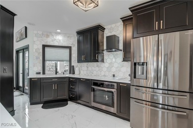 Located in the highly desired golf community of Cape Royal, this on Royal Tee Country Club in Florida - for sale on GolfHomes.com, golf home, golf lot