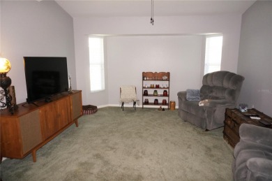 Impressive 3 Bedroom, 2 Bathroom home with attached oversized 2 on Deep Creek Golf Club in Florida - for sale on GolfHomes.com, golf home, golf lot