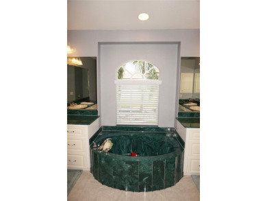 Impressive 3 Bedroom, 2 Bathroom home with attached oversized 2 on Deep Creek Golf Club in Florida - for sale on GolfHomes.com, golf home, golf lot