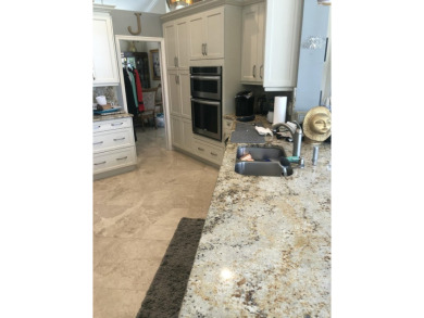 This home has an upgraded kitchen, marble floors and an upgraded on Aberdeen Golf and Country Club in Florida - for sale on GolfHomes.com, golf home, golf lot