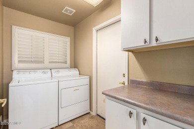 Welcome to this beautiful 2-bedroom, 2-bathroom home with a den on Eagles Nest at Pebble Creek in Arizona - for sale on GolfHomes.com, golf home, golf lot