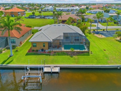 PUNTA GORDA ISLES!! BEAUTIFUL 4 BEDROOM PLUS DEN, 3 BATH, 3 CAR on Saint Andrews South Golf Club in Florida - for sale on GolfHomes.com, golf home, golf lot