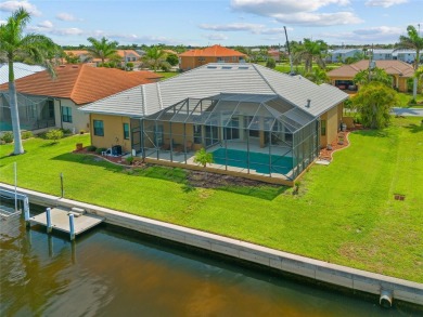 PUNTA GORDA ISLES!! BEAUTIFUL 4 BEDROOM PLUS DEN, 3 BATH, 3 CAR on Saint Andrews South Golf Club in Florida - for sale on GolfHomes.com, golf home, golf lot