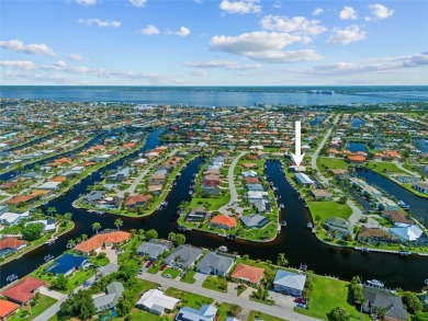 PUNTA GORDA ISLES!! BEAUTIFUL 4 BEDROOM PLUS DEN, 3 BATH, 3 CAR on Saint Andrews South Golf Club in Florida - for sale on GolfHomes.com, golf home, golf lot