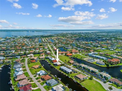 PUNTA GORDA ISLES!! BEAUTIFUL 4 BEDROOM PLUS DEN, 3 BATH, 3 CAR on Saint Andrews South Golf Club in Florida - for sale on GolfHomes.com, golf home, golf lot