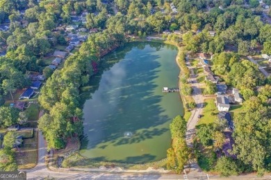 Discover your own urban oasis in the heart of East Lake! This on East Lake Golf Club in Georgia - for sale on GolfHomes.com, golf home, golf lot