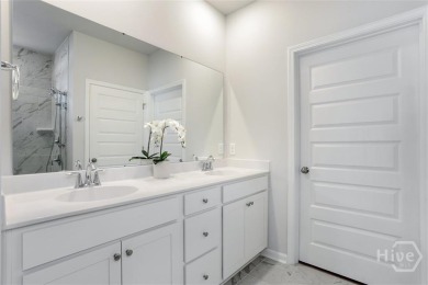 Enjoy low maintenance living in this immaculate single story on Savannah Quarters Country Club in Georgia - for sale on GolfHomes.com, golf home, golf lot
