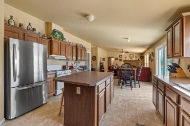 Spacious, clean, and move-in ready, this 4 bedroom, 2 bathroom on La Contenta Golf Course in California - for sale on GolfHomes.com, golf home, golf lot