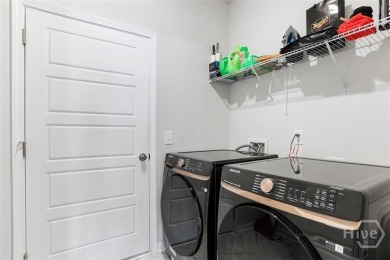 Enjoy low maintenance living in this immaculate single story on Savannah Quarters Country Club in Georgia - for sale on GolfHomes.com, golf home, golf lot