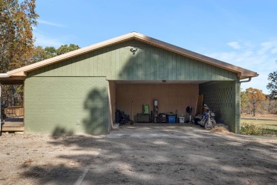 Welcome to this beautifully updated all-brick 4-bedroom on Rolling Hills Country Club in Arkansas - for sale on GolfHomes.com, golf home, golf lot