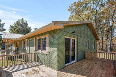 Welcome to this beautifully updated all-brick 4-bedroom on Rolling Hills Country Club in Arkansas - for sale on GolfHomes.com, golf home, golf lot