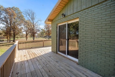 Welcome to this beautifully updated all-brick 4-bedroom on Rolling Hills Country Club in Arkansas - for sale on GolfHomes.com, golf home, golf lot