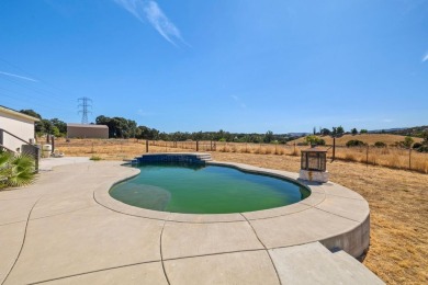 Spacious, clean, and move-in ready, this 4 bedroom, 2 bathroom on La Contenta Golf Course in California - for sale on GolfHomes.com, golf home, golf lot