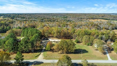 Welcome to this beautifully updated all-brick 4-bedroom on Rolling Hills Country Club in Arkansas - for sale on GolfHomes.com, golf home, golf lot