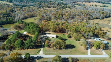 Welcome to this beautifully updated all-brick 4-bedroom on Rolling Hills Country Club in Arkansas - for sale on GolfHomes.com, golf home, golf lot