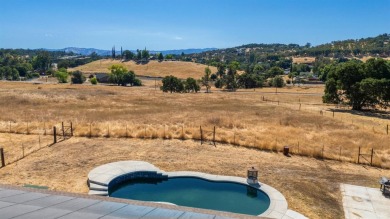 Spacious, clean, and move-in ready, this 4 bedroom, 2 bathroom on La Contenta Golf Course in California - for sale on GolfHomes.com, golf home, golf lot