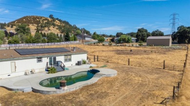 Spacious, clean, and move-in ready, this 4 bedroom, 2 bathroom on La Contenta Golf Course in California - for sale on GolfHomes.com, golf home, golf lot