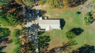 Welcome to this beautifully updated all-brick 4-bedroom on Rolling Hills Country Club in Arkansas - for sale on GolfHomes.com, golf home, golf lot