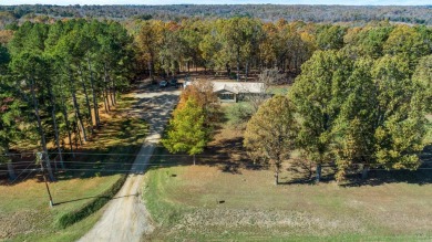 Welcome to this beautifully updated all-brick 4-bedroom on Rolling Hills Country Club in Arkansas - for sale on GolfHomes.com, golf home, golf lot