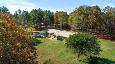 Welcome to this beautifully updated all-brick 4-bedroom on Rolling Hills Country Club in Arkansas - for sale on GolfHomes.com, golf home, golf lot