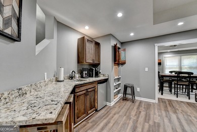 Stately 6-bedroom, 5-bath executive home built by award-winning on Woodmont Golf and Country Club in Georgia - for sale on GolfHomes.com, golf home, golf lot