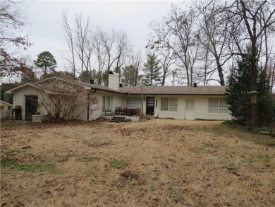 This sprawling brick ranch is in the perfect location! Minutes on Cherokee Golf and Country Club in Georgia - for sale on GolfHomes.com, golf home, golf lot