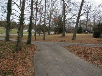 This sprawling brick ranch is in the perfect location! Minutes on Cherokee Golf and Country Club in Georgia - for sale on GolfHomes.com, golf home, golf lot