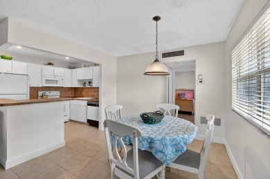 Welcome home! This one-story end-unit villa has 1 bedroom and 1 on Kings Point Golf - Executive in Florida - for sale on GolfHomes.com, golf home, golf lot