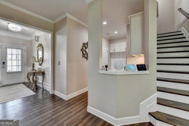 Nestled in a serene cul-de-sac, this meticulously maintained on Reunion Golf Club in Georgia - for sale on GolfHomes.com, golf home, golf lot