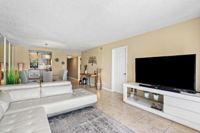Beautifully updated 2BD/2BA condo at The Palms of Deer Creek in on Deer Creek Golf Club in Florida - for sale on GolfHomes.com, golf home, golf lot
