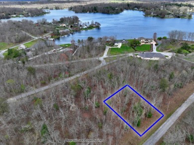Check out this nice level and wooded lot right across the street on Lake Tansi Village Country Club in Tennessee - for sale on GolfHomes.com, golf home, golf lot