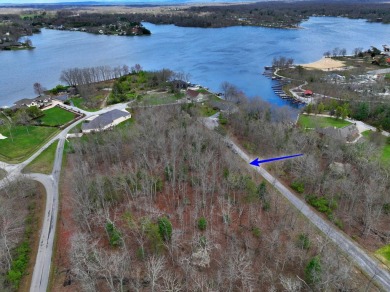 Check out this nice level and wooded lot right across the street on Lake Tansi Village Country Club in Tennessee - for sale on GolfHomes.com, golf home, golf lot