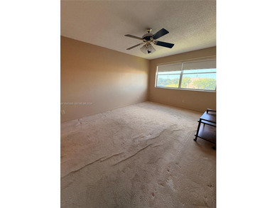 55+ Community, Move-in ready 2 bedroom + den, spacious enclosed on Sunrise Lakes Phase III in Florida - for sale on GolfHomes.com, golf home, golf lot