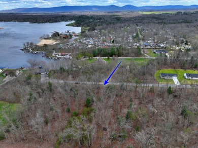 Check out this nice level and wooded lot right across the street on Lake Tansi Village Country Club in Tennessee - for sale on GolfHomes.com, golf home, golf lot