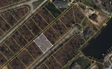 Check out this nice level and wooded lot right across the street on Lake Tansi Village Country Club in Tennessee - for sale on GolfHomes.com, golf home, golf lot