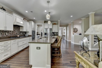 Nestled in a serene cul-de-sac, this meticulously maintained on Reunion Golf Club in Georgia - for sale on GolfHomes.com, golf home, golf lot