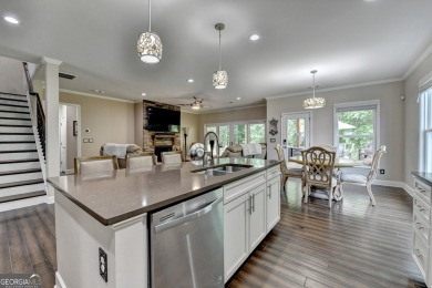 Nestled in a serene cul-de-sac, this meticulously maintained on Reunion Golf Club in Georgia - for sale on GolfHomes.com, golf home, golf lot