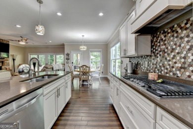 Nestled in a serene cul-de-sac, this meticulously maintained on Reunion Golf Club in Georgia - for sale on GolfHomes.com, golf home, golf lot
