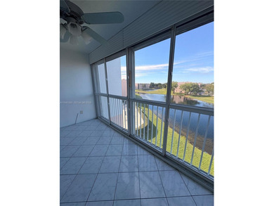 55+ Community, Move-in ready 2 bedroom + den, spacious enclosed on Sunrise Lakes Phase III in Florida - for sale on GolfHomes.com, golf home, golf lot