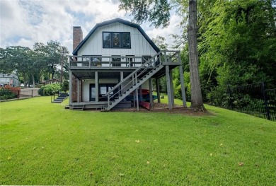 Lakefront Charm Meets Updated Comfort in Hideaway Lake Welcome on Hide-A-Way Lake Golf Course in Texas - for sale on GolfHomes.com, golf home, golf lot