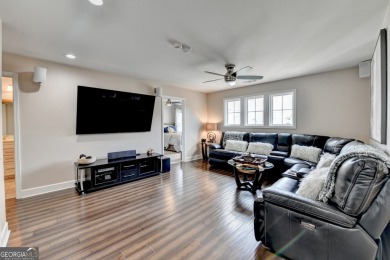 Nestled in a serene cul-de-sac, this meticulously maintained on Reunion Golf Club in Georgia - for sale on GolfHomes.com, golf home, golf lot