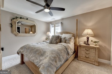 Nestled in a serene cul-de-sac, this meticulously maintained on Reunion Golf Club in Georgia - for sale on GolfHomes.com, golf home, golf lot