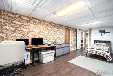 Welcome to this slice of paradise in the sought-after Highland on Highland Hills Golf Course in Colorado - for sale on GolfHomes.com, golf home, golf lot