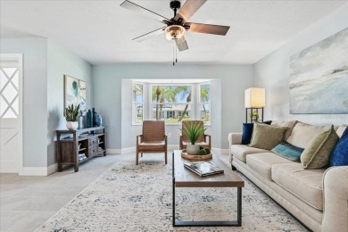 Fully remodeled home with golf and water views in the on Rotonda Golf and Country Club The Hills Course in Florida - for sale on GolfHomes.com, golf home, golf lot