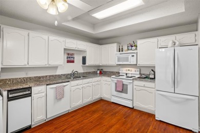 BEAUTIFUL 2ND FLOOR CONDO within walking distance to the on Pecan Plantation Country Club in Texas - for sale on GolfHomes.com, golf home, golf lot