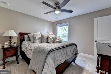 Nestled in a serene cul-de-sac, this meticulously maintained on Reunion Golf Club in Georgia - for sale on GolfHomes.com, golf home, golf lot