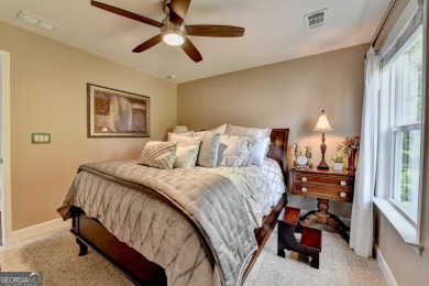 Nestled in a serene cul-de-sac, this meticulously maintained on Reunion Golf Club in Georgia - for sale on GolfHomes.com, golf home, golf lot