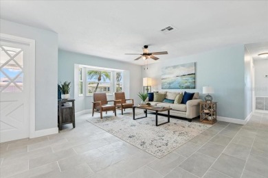 Fully remodeled home with golf and water views in the on Rotonda Golf and Country Club The Hills Course in Florida - for sale on GolfHomes.com, golf home, golf lot